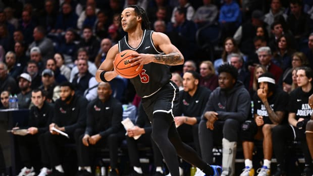 Nov 29, 2023; Villanova, Pennsylvania, USA; Saint Joseph's Hawks guard Lynn Greer III (5) passes the ball against the Villanova Wildcats in the first half at William B. Finneran Pavilion. 